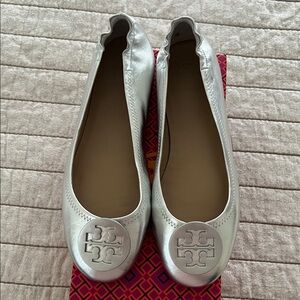 Tory Burch Metallic Silver Flats. New never worn